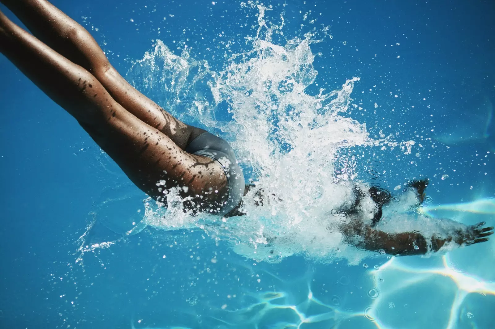 Woman diving with a splash
