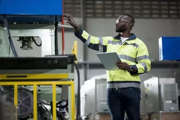 Man operating a machine