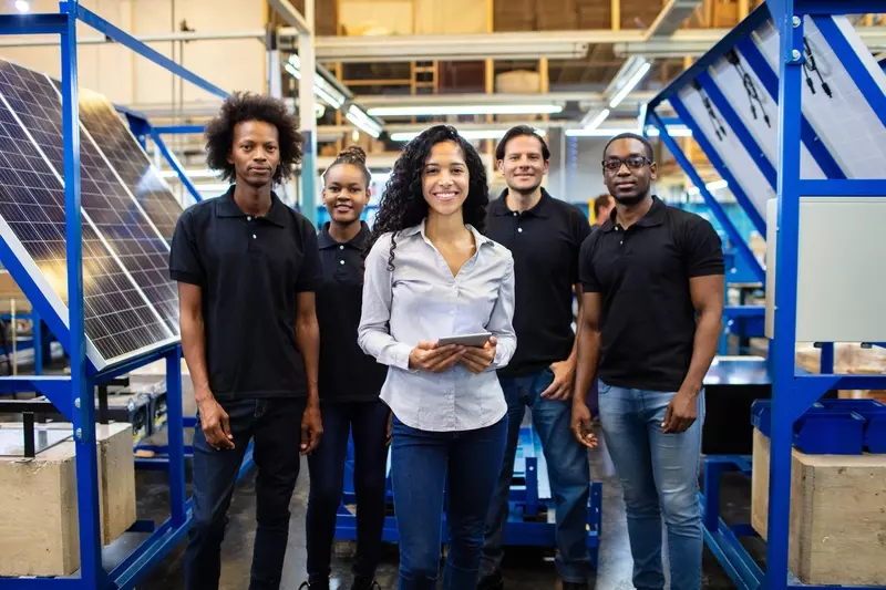 Diverse group of people in a manufacturing plant
